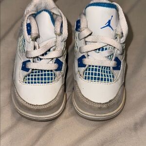 Kids White and Blue Jordan 4’s Sneakers